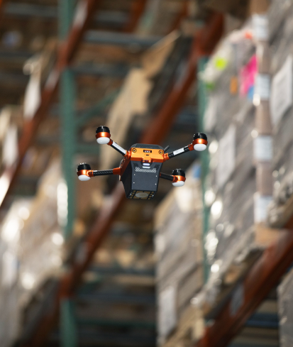 autonomous drone in a warehouse