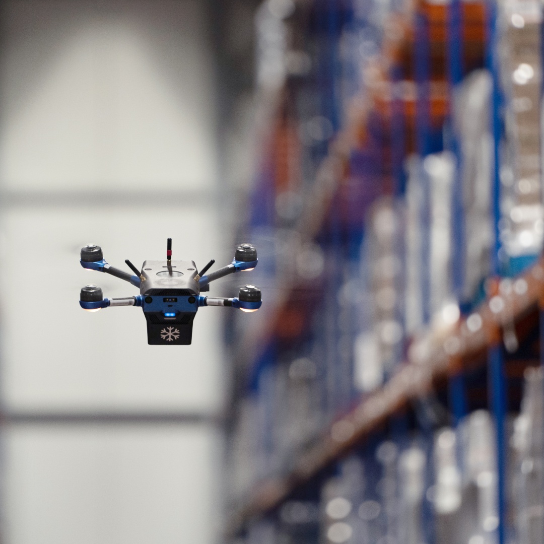 Corvus drone scanning inventory racks in a cold storage facility
