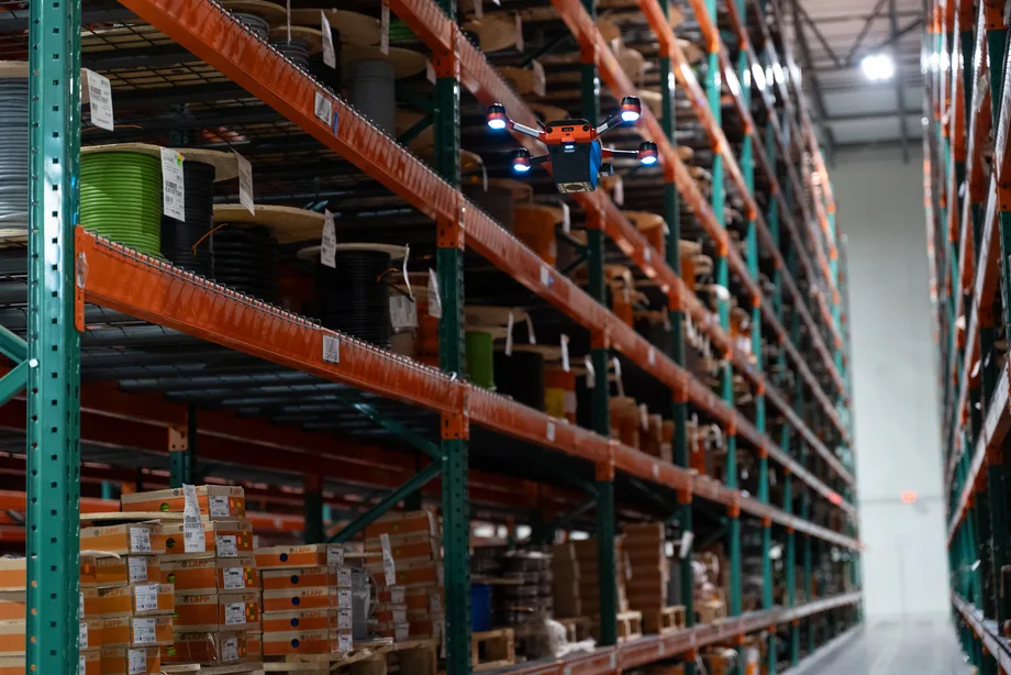 Corvus One autonomous drone scanning inventory inside a large enterprise warehouse