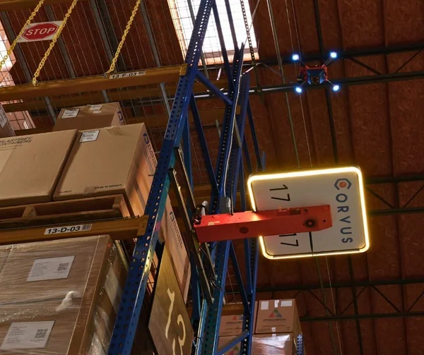 A Corvus One autonomous inventory drone scans pallets of inventory at Dermalogica's global headquarters