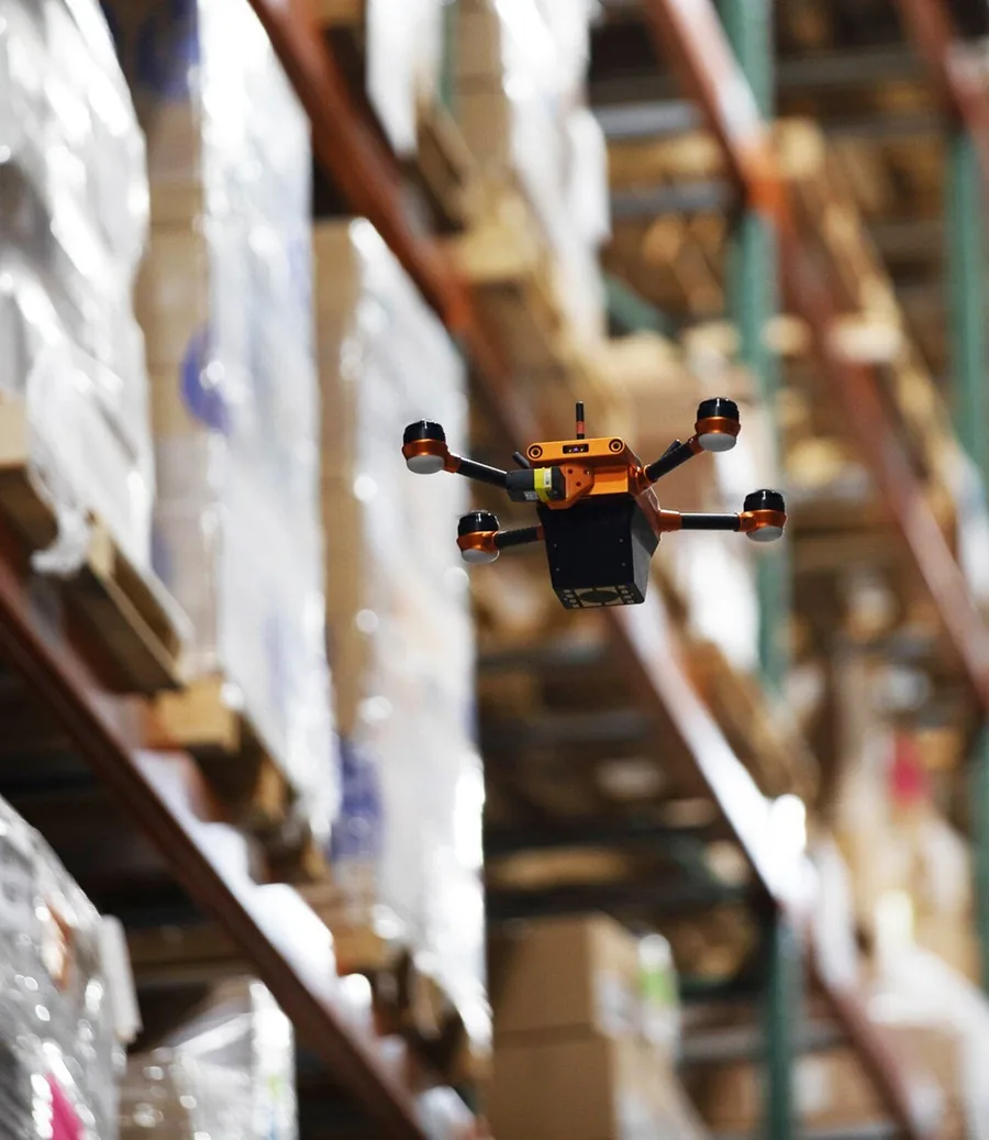 A Corvus One autonomous inventory drone scans a pallet rack at Staci Americas' multi-client 3PL warehouse