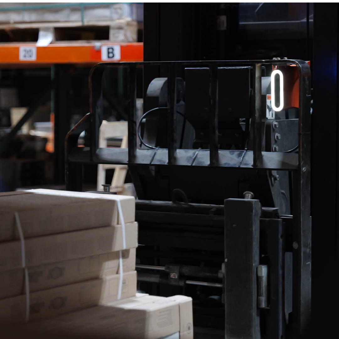 Corvus Trident AI copilot mounted on forklift in warehouse